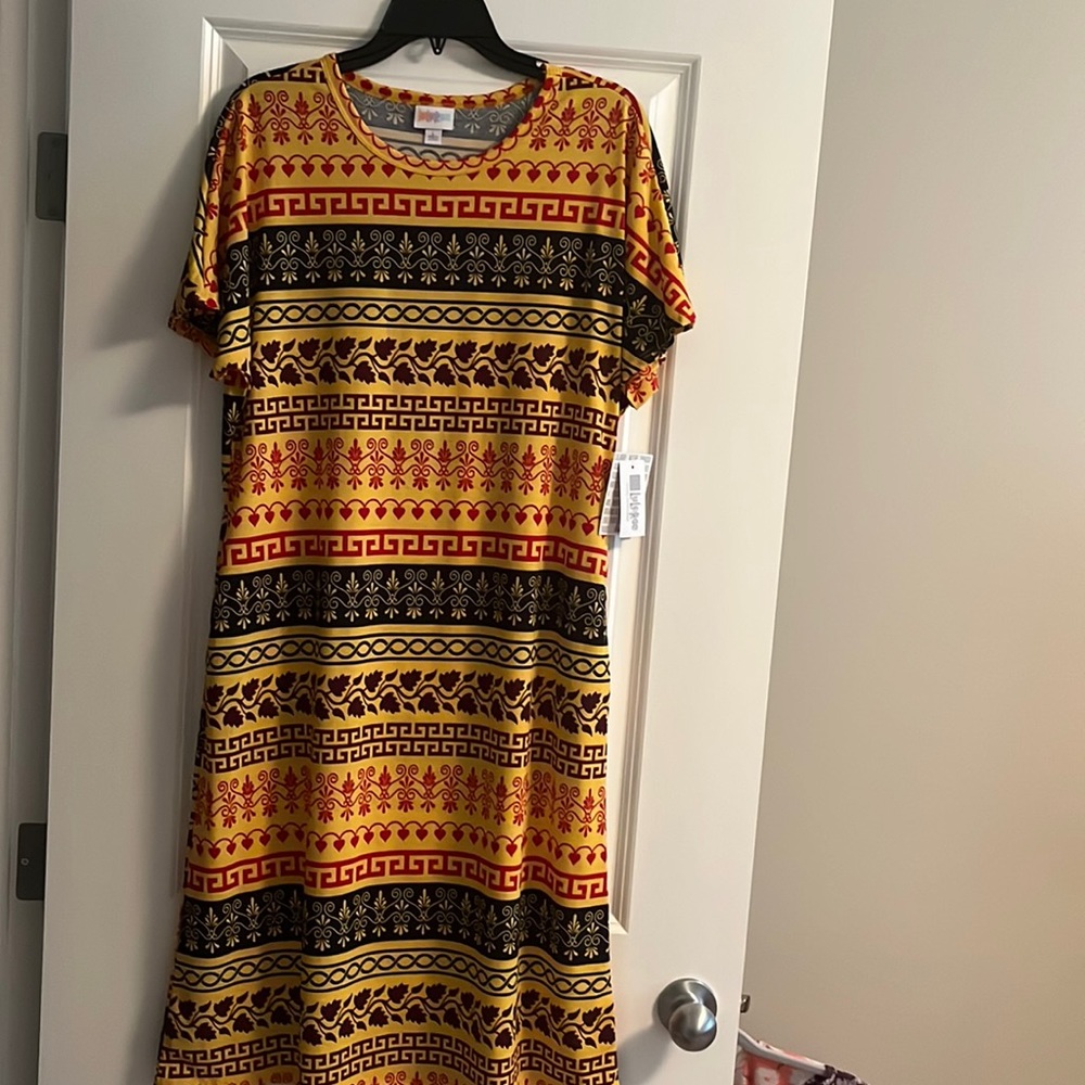 New with tags beautiful yellow/ multicoloured dress!